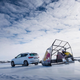 Illustration for article titled Watch Kjeld Nuis Break An Ice Skating Speed Record Drafting Behind A Seat SUV